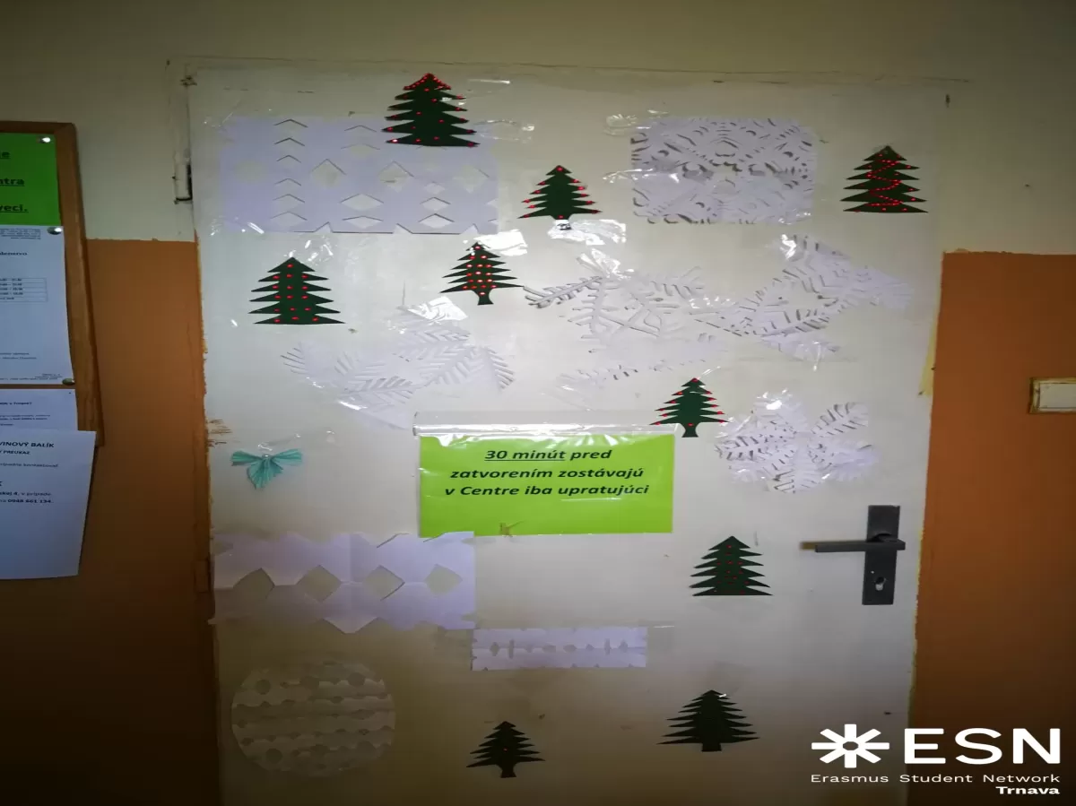 Door decorated by Christmas paper decoration made by Erasmus students, homeless people, workers of charity and coordinator.