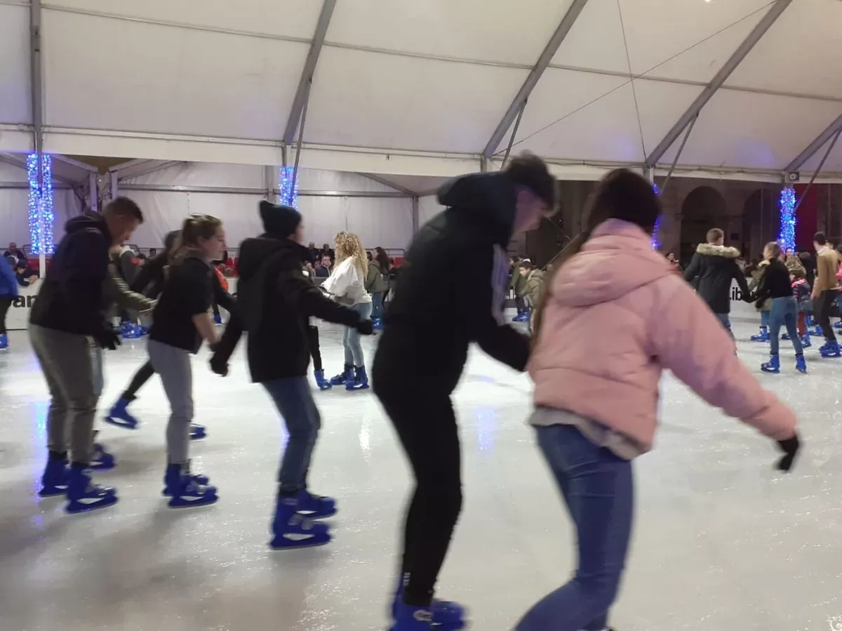 Ice skating in a four people group