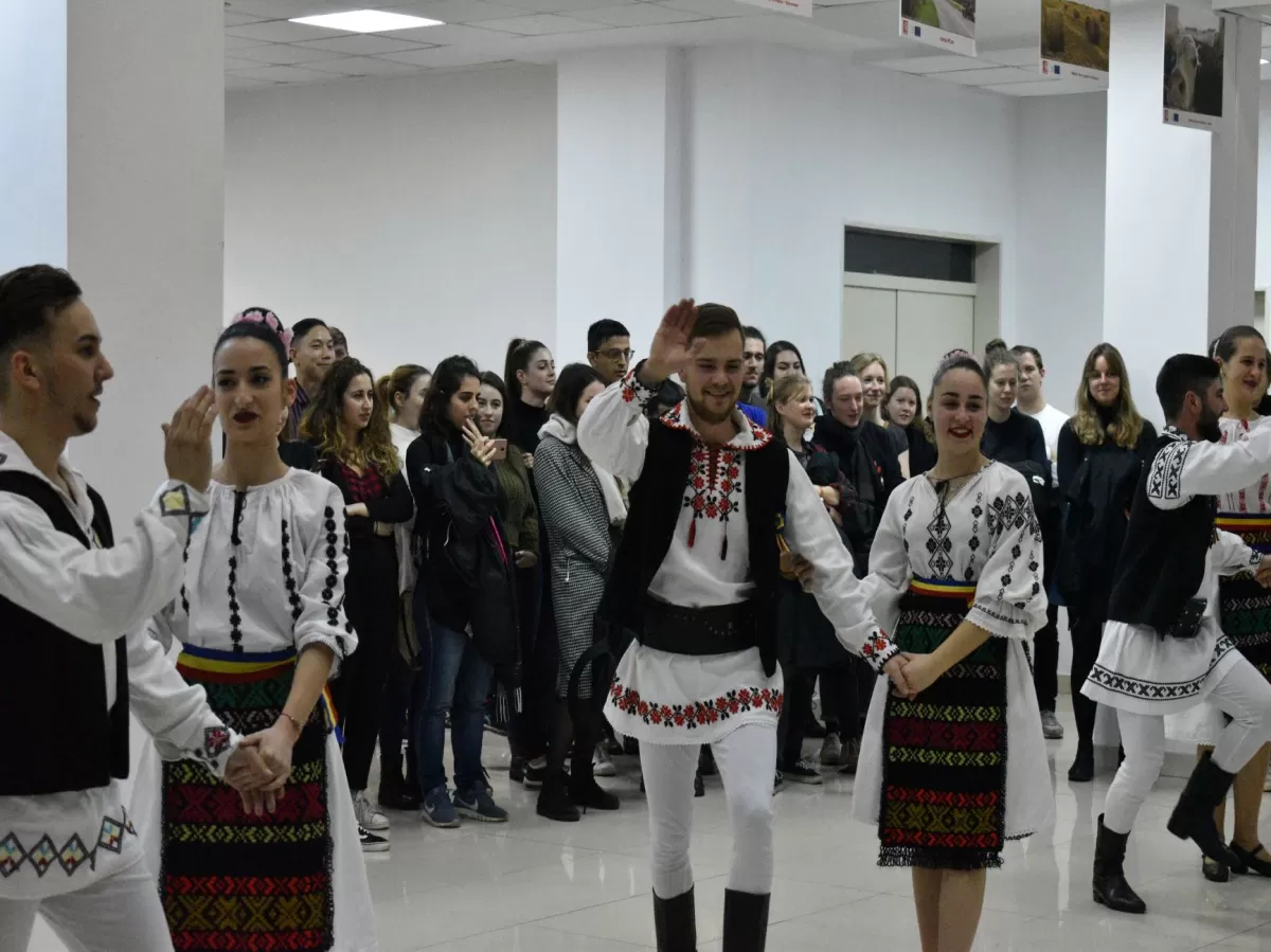Group of Romanian dancers presenting a dance