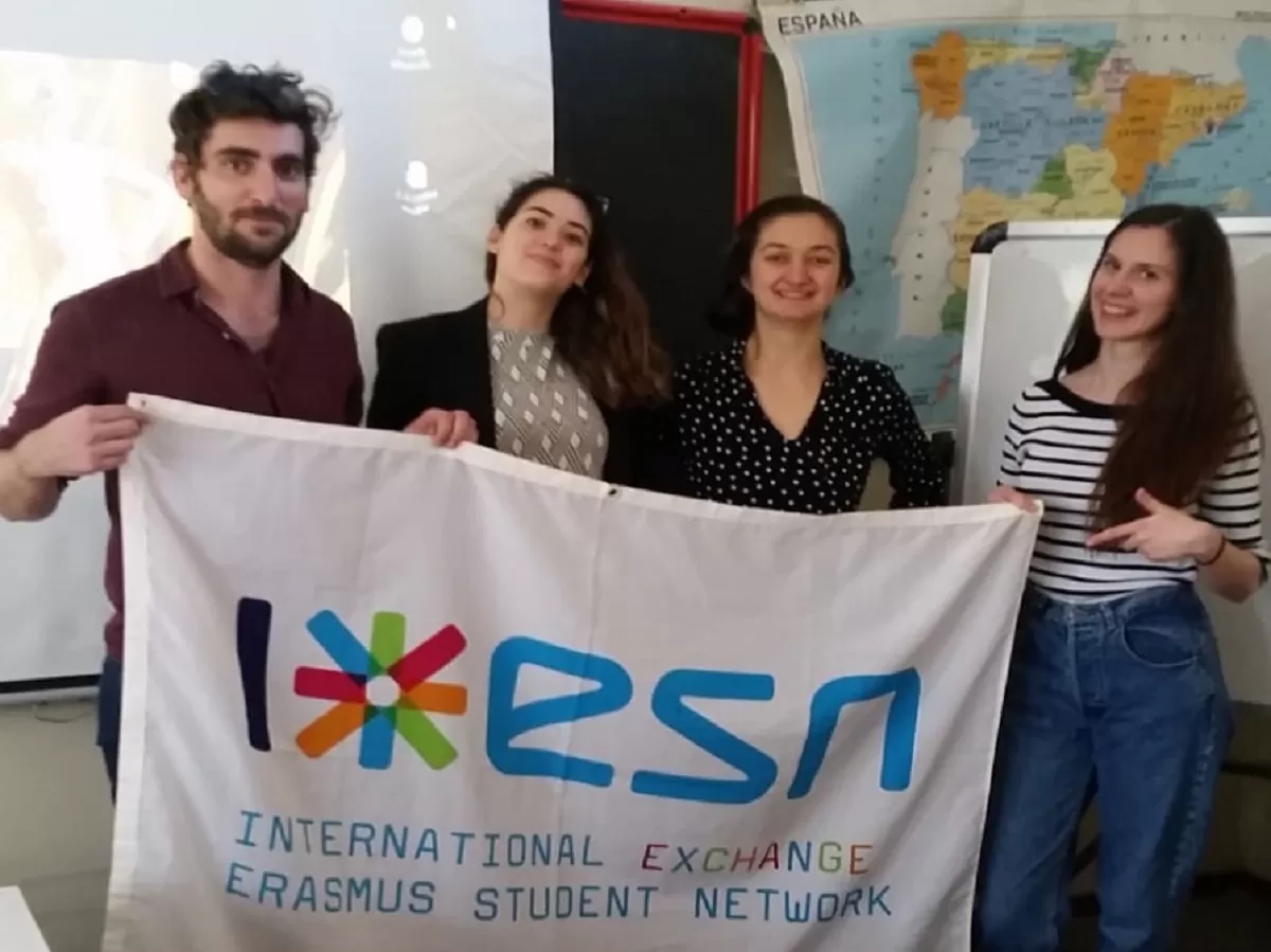 Group of international students volunteering in a classroom
