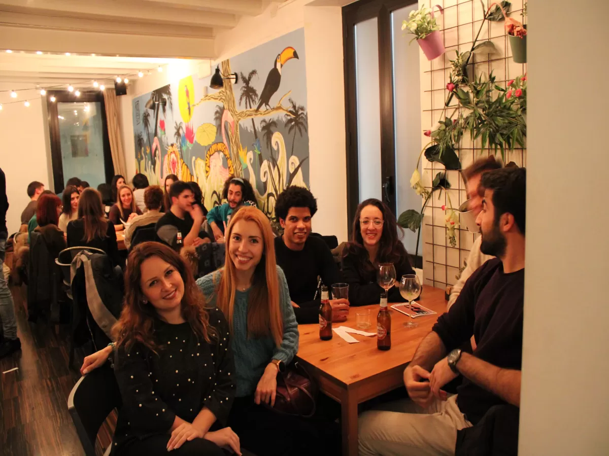 International students around a german tandem table