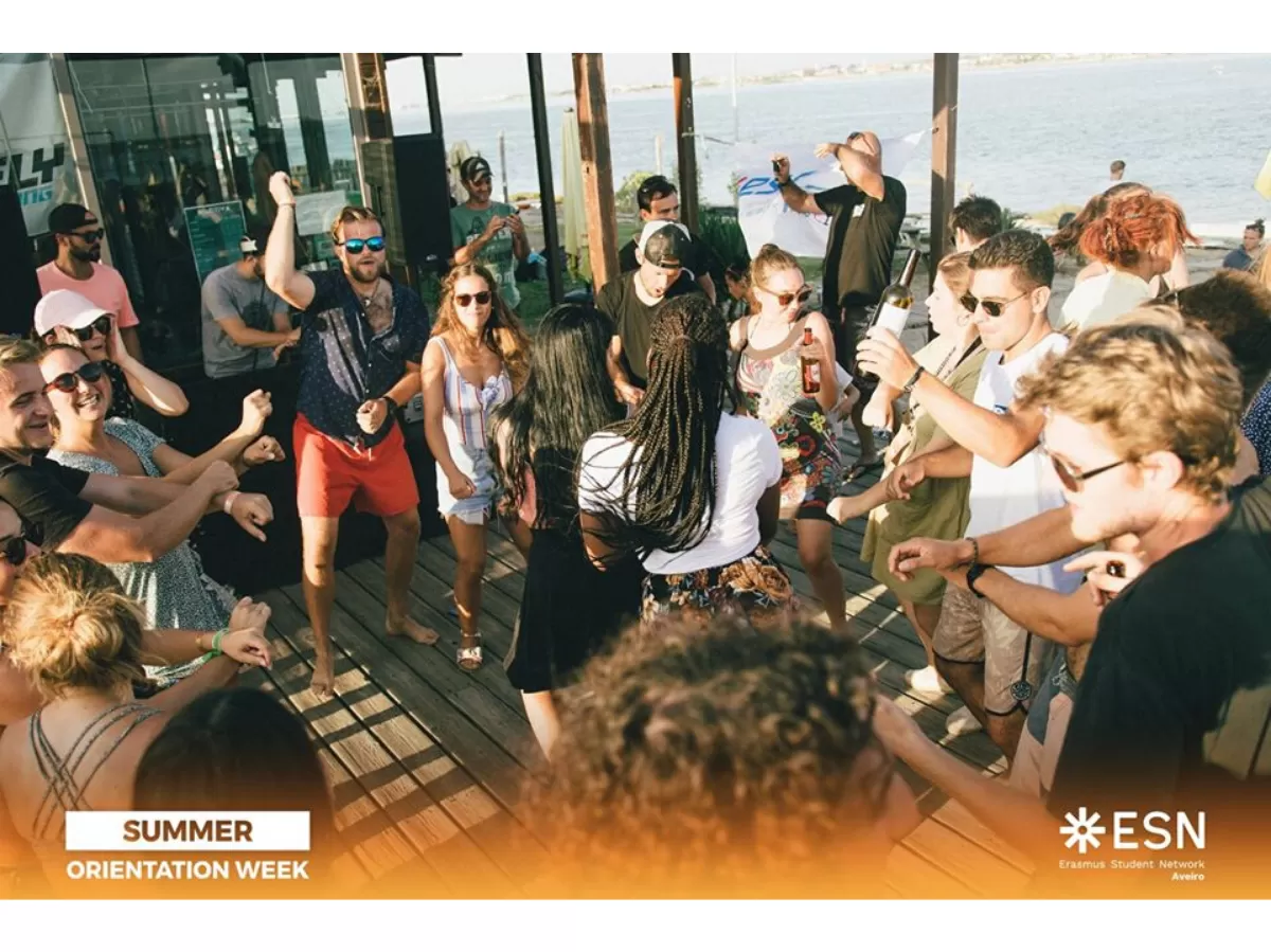 The Erasmus are dancing and having fun while the DJ plays known music.