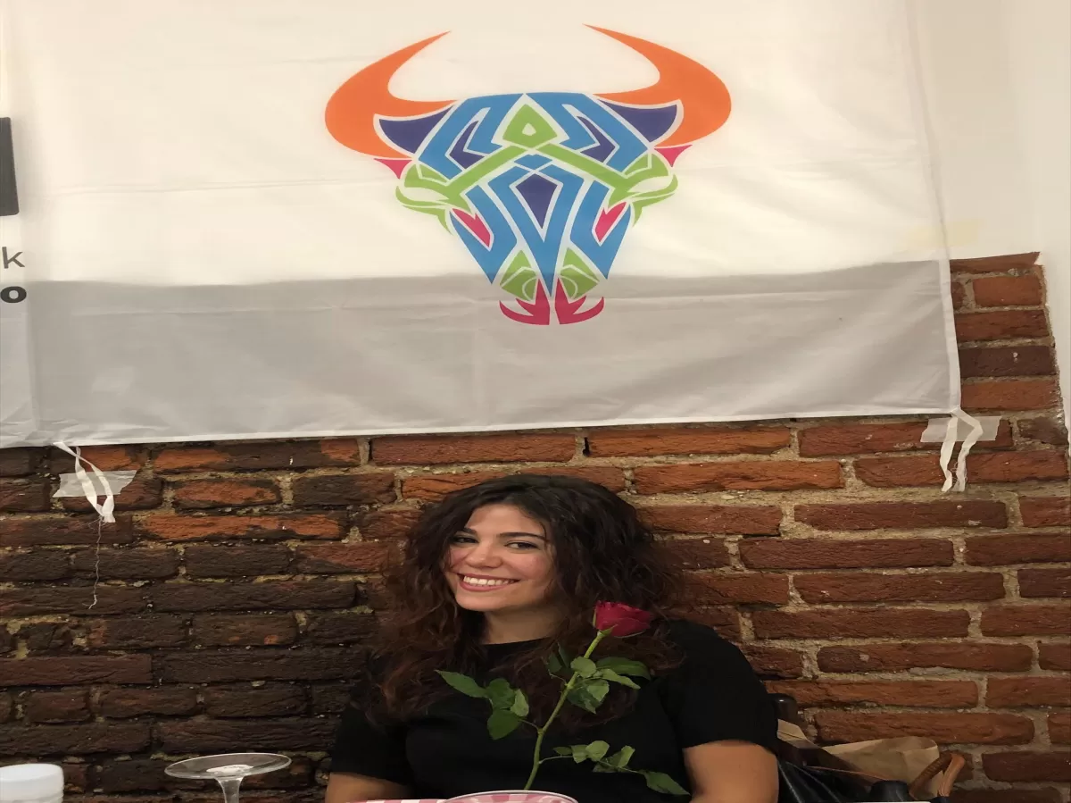 Girl with a rose with ESN Torino flag behind