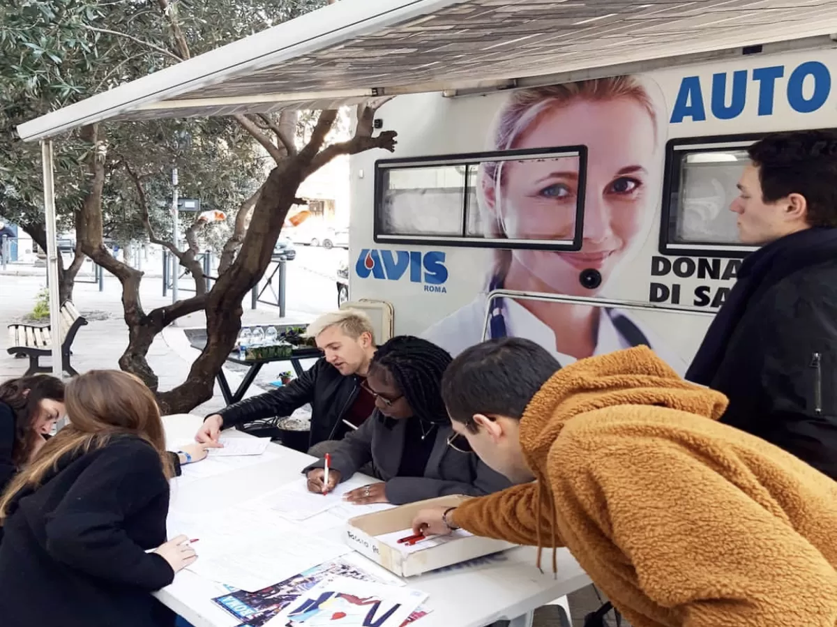 Erasmus Students signing documents for the blood donation