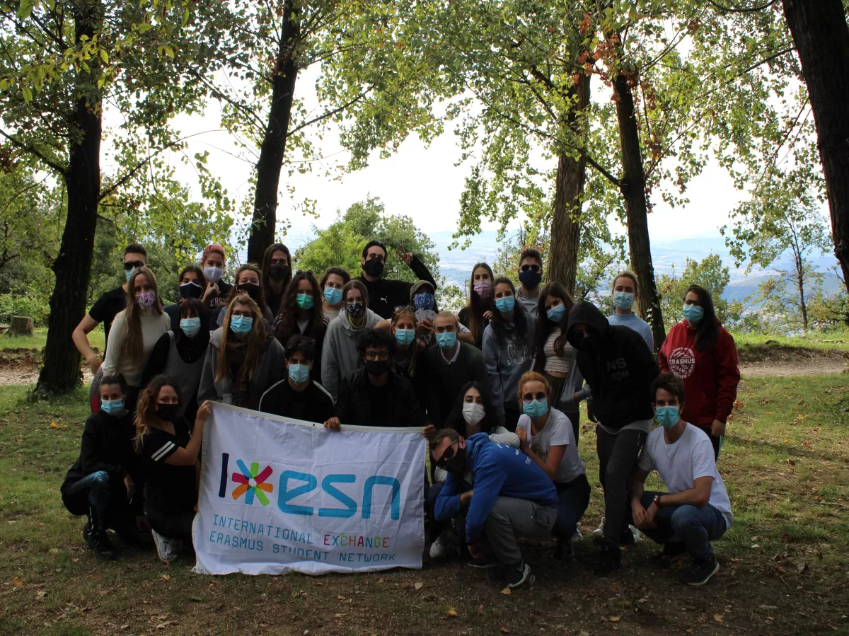 group of people holding the esn flag