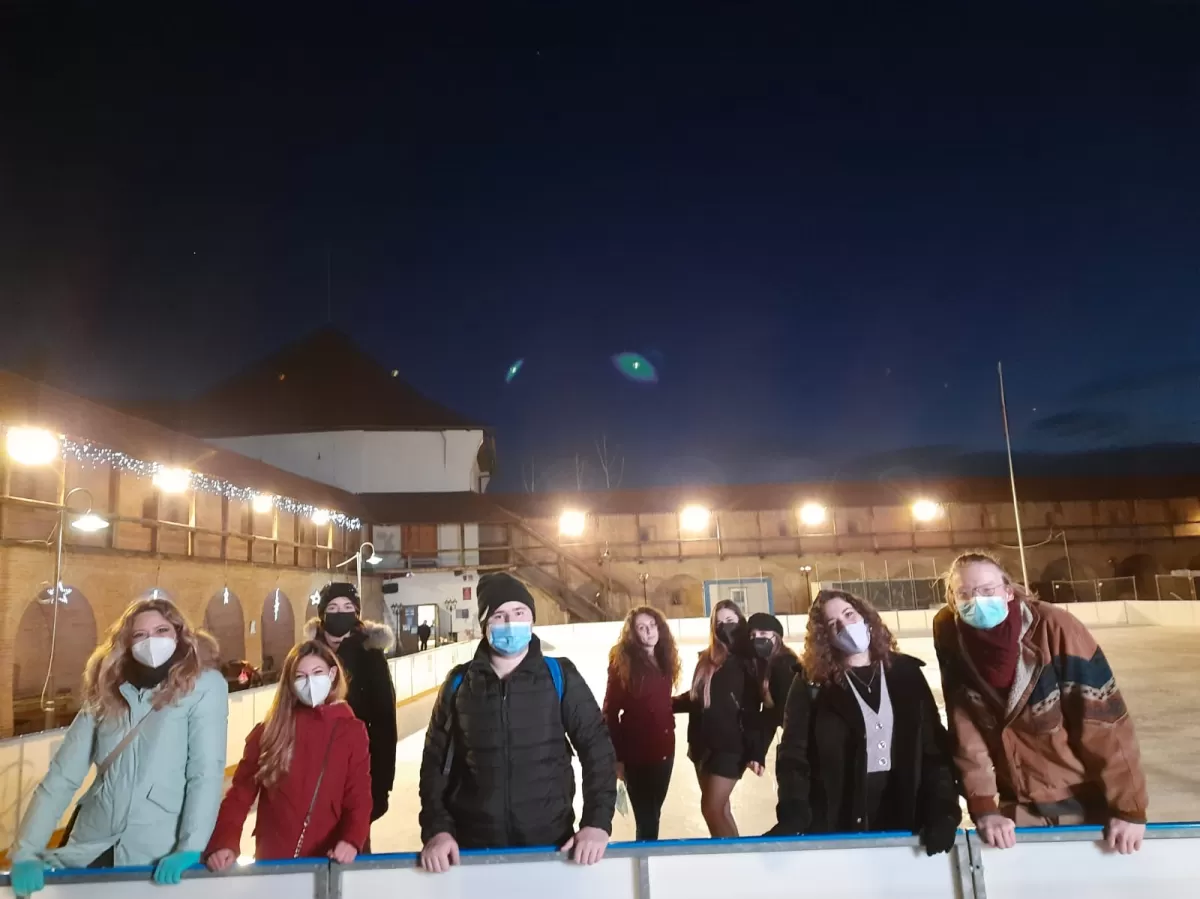 Few of us on the ice skating rink.