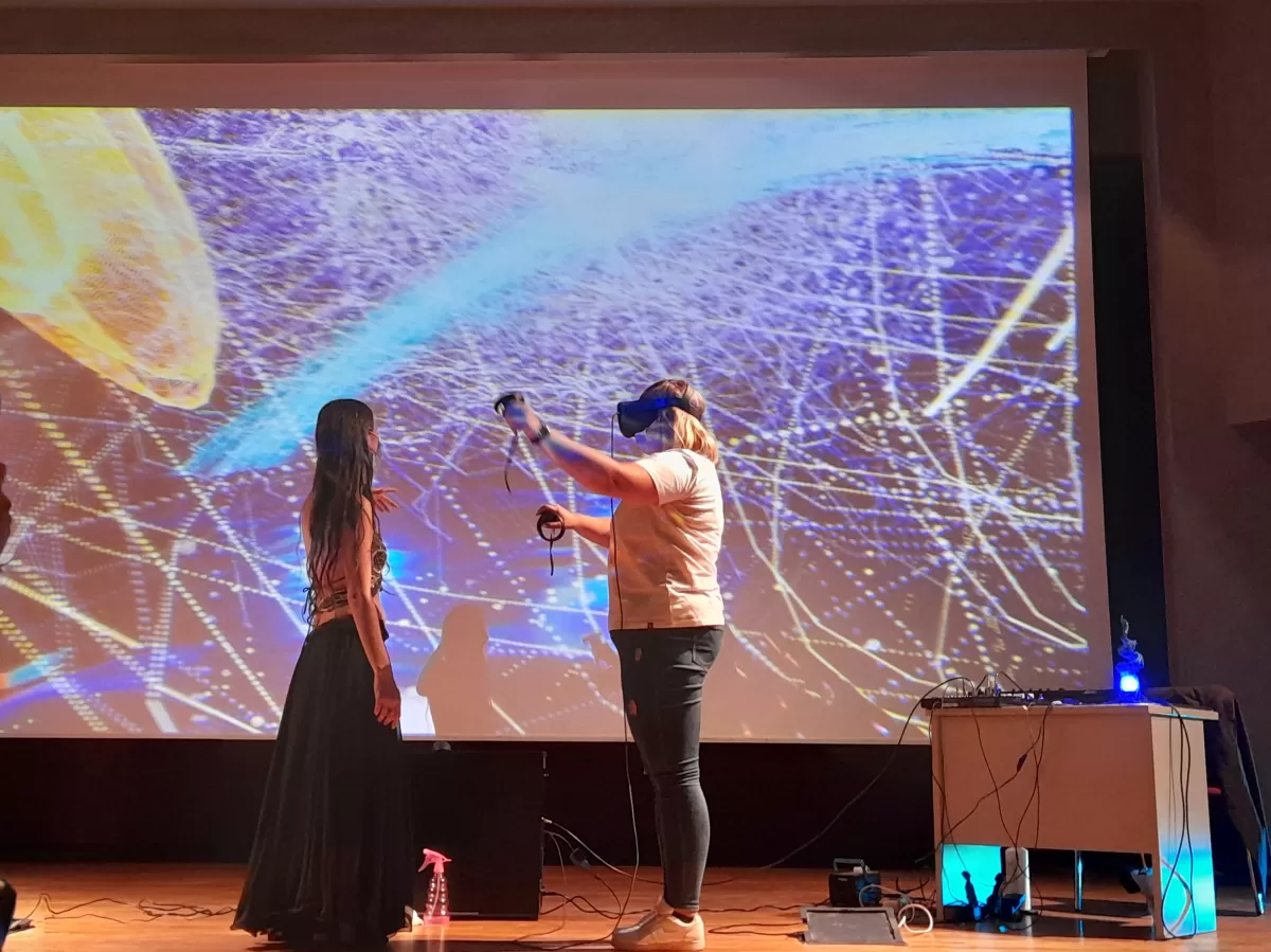 A person who's experiencing a virtual reality artwork