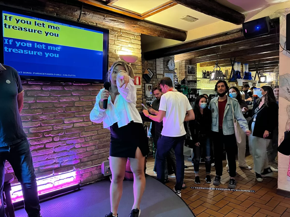 International students singing at the karaoke night