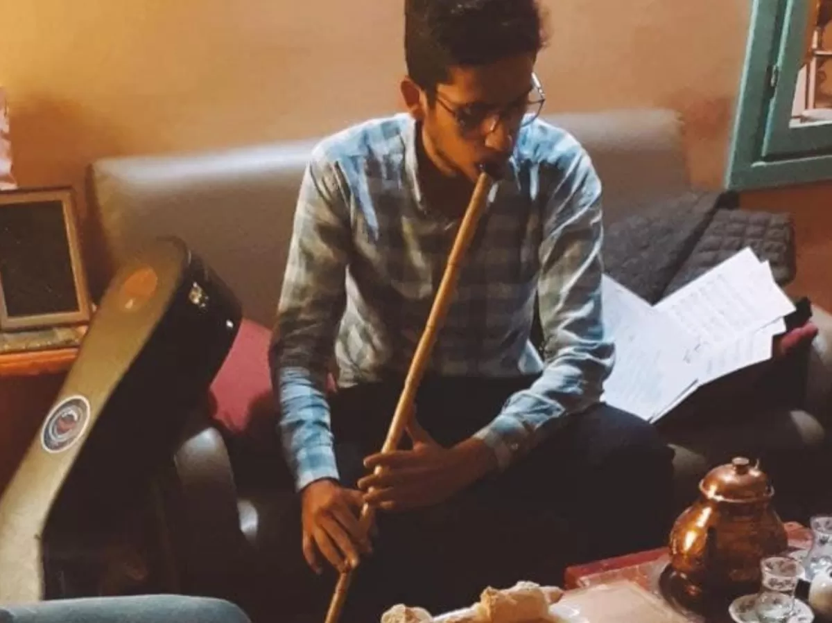 a turkish guy playing his flute