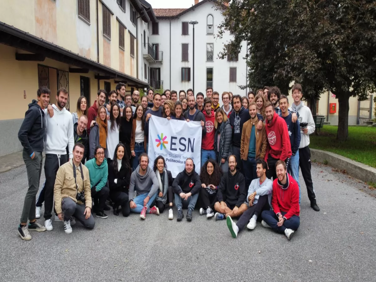 Group of ESN volunteers posing with the ESN flag 