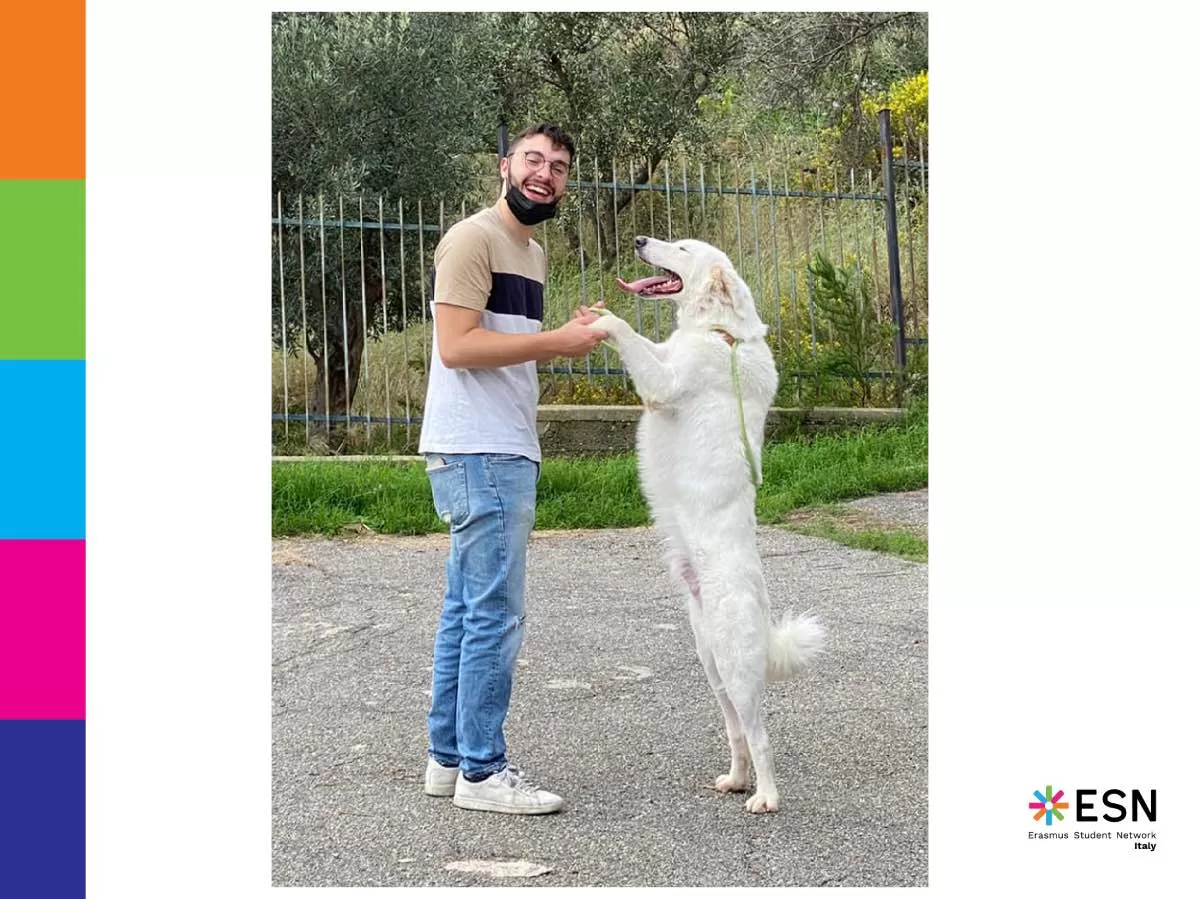The ESN Messina's presidente playing with a dog