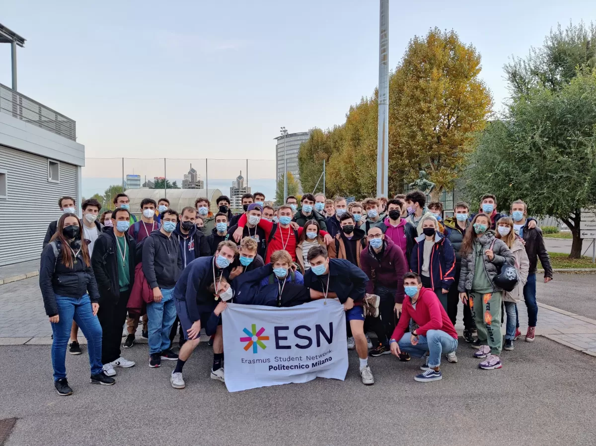 Group of ESN people and international students posing with ESN flag after the tournaments