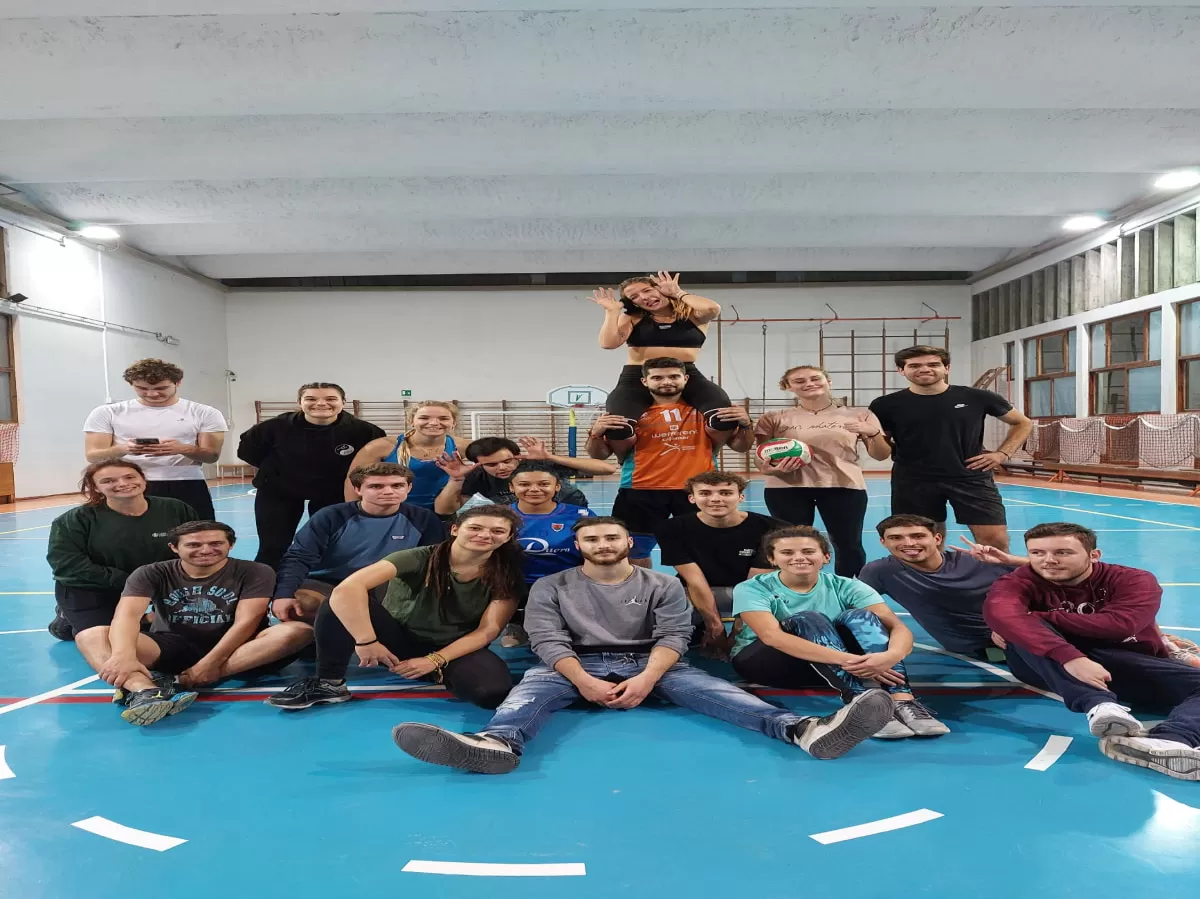 Group of international students volley ball match