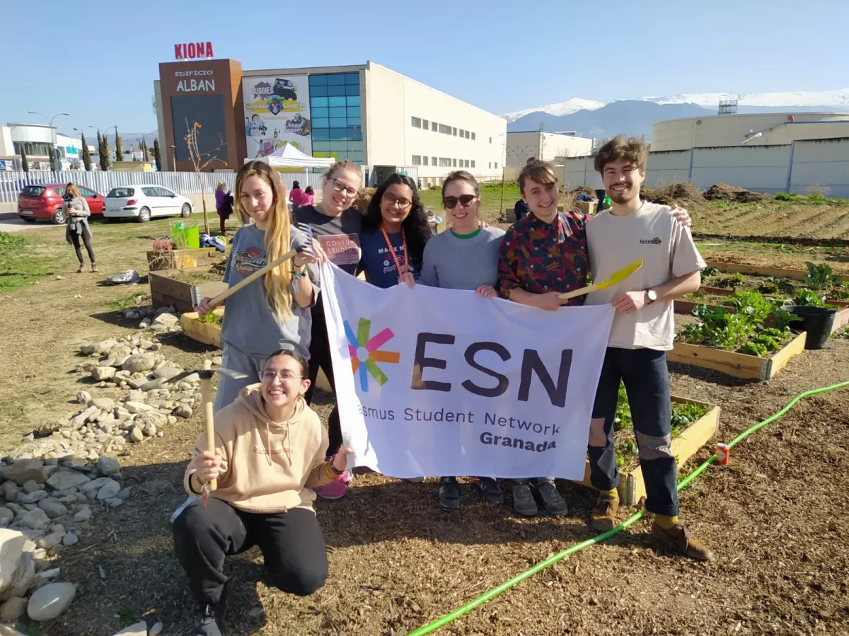 Students holding the ESN Granada flaj