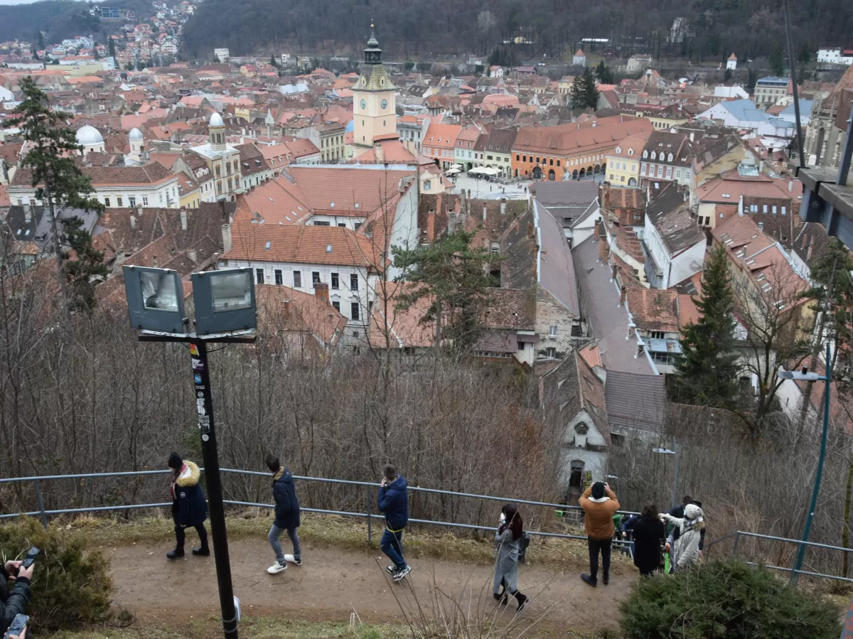 Group of international students climbing to the White Tower 