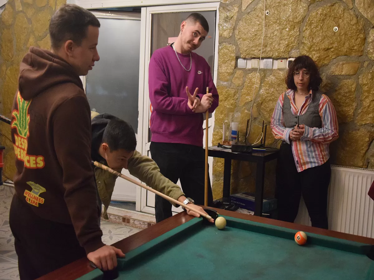 Group of people playing pool