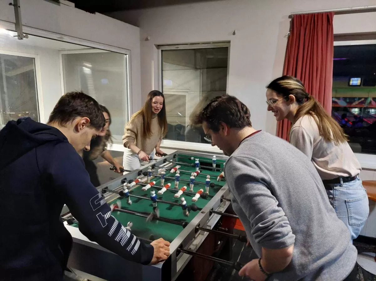 Students playing table football.