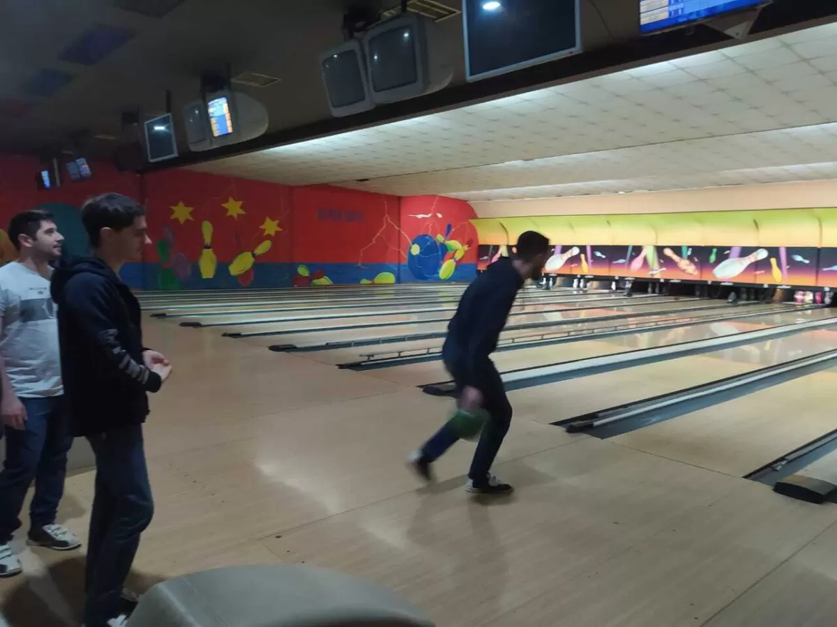 Students playing bowling.