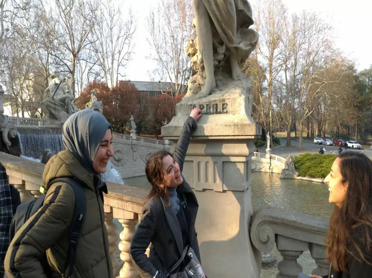 A team is picking up a marker they just found