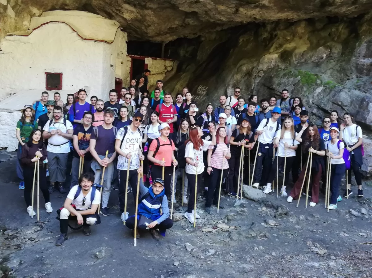 Students in the cave of Saint Dionisios