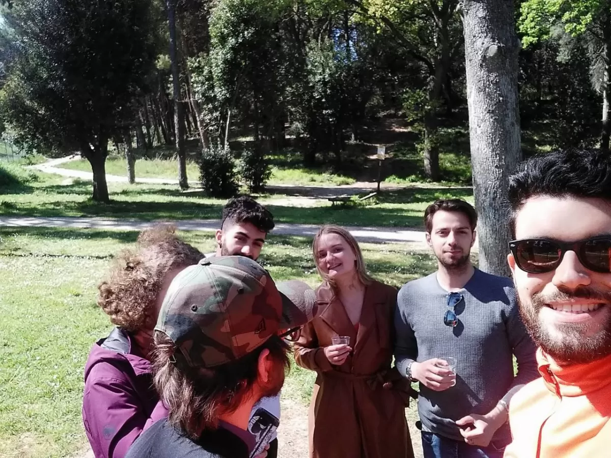 group of people posing for a selfie
