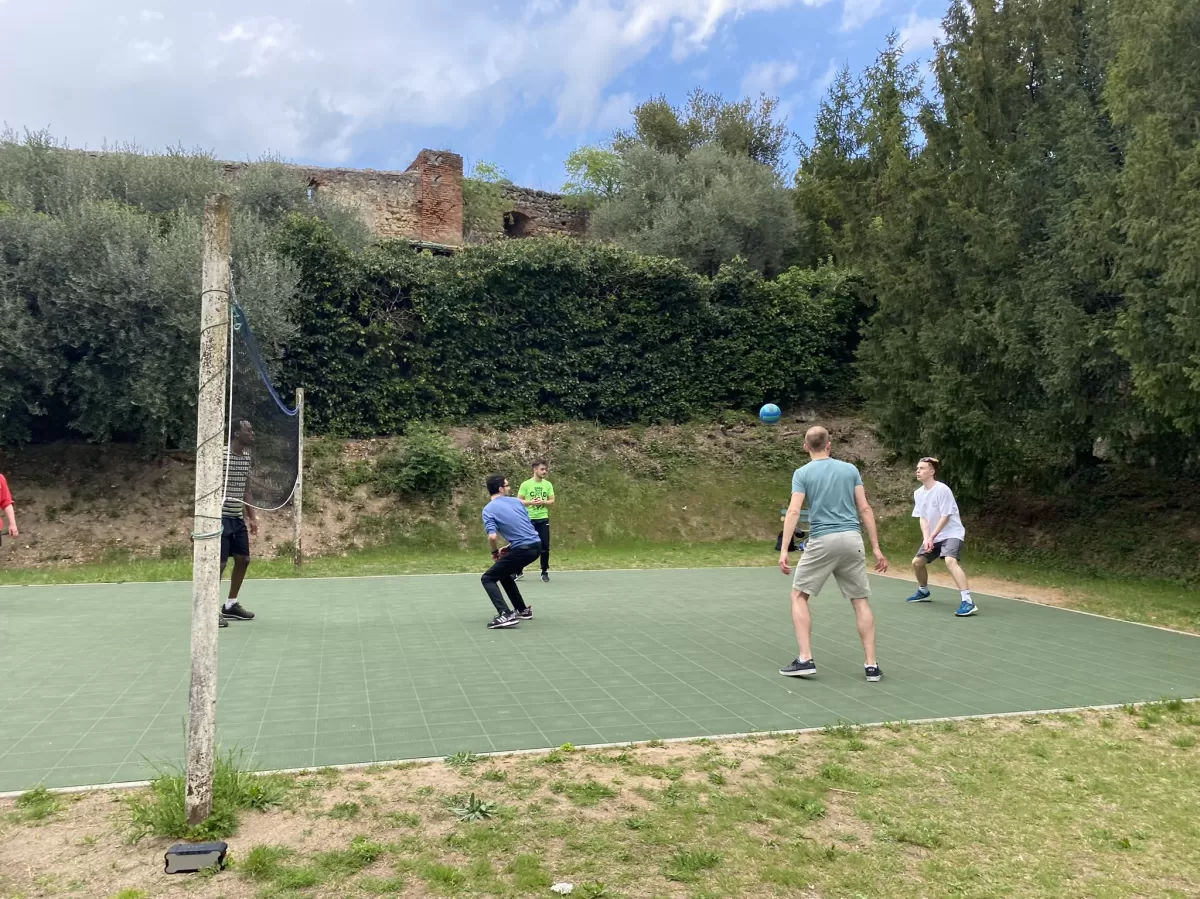 International students playing volleyball