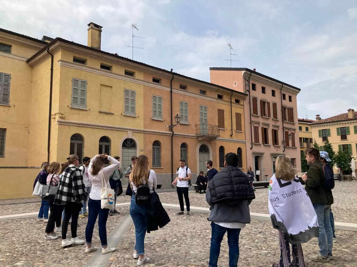 students listening to a guide in Mantua