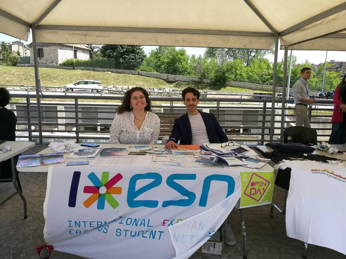 two volunteers posing at their esn stand