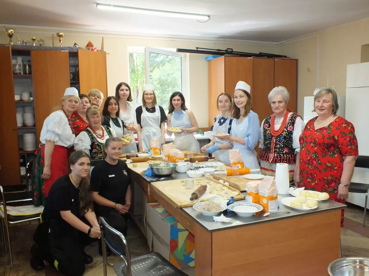 Local Housewives Club teached exchange students how to make pierogi