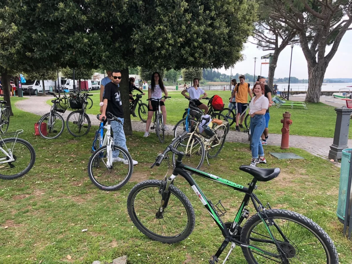 a group of students taking a break from from biking