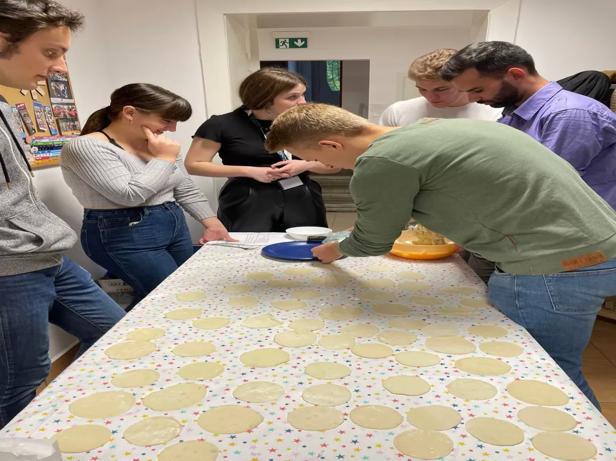 Students making pierogi