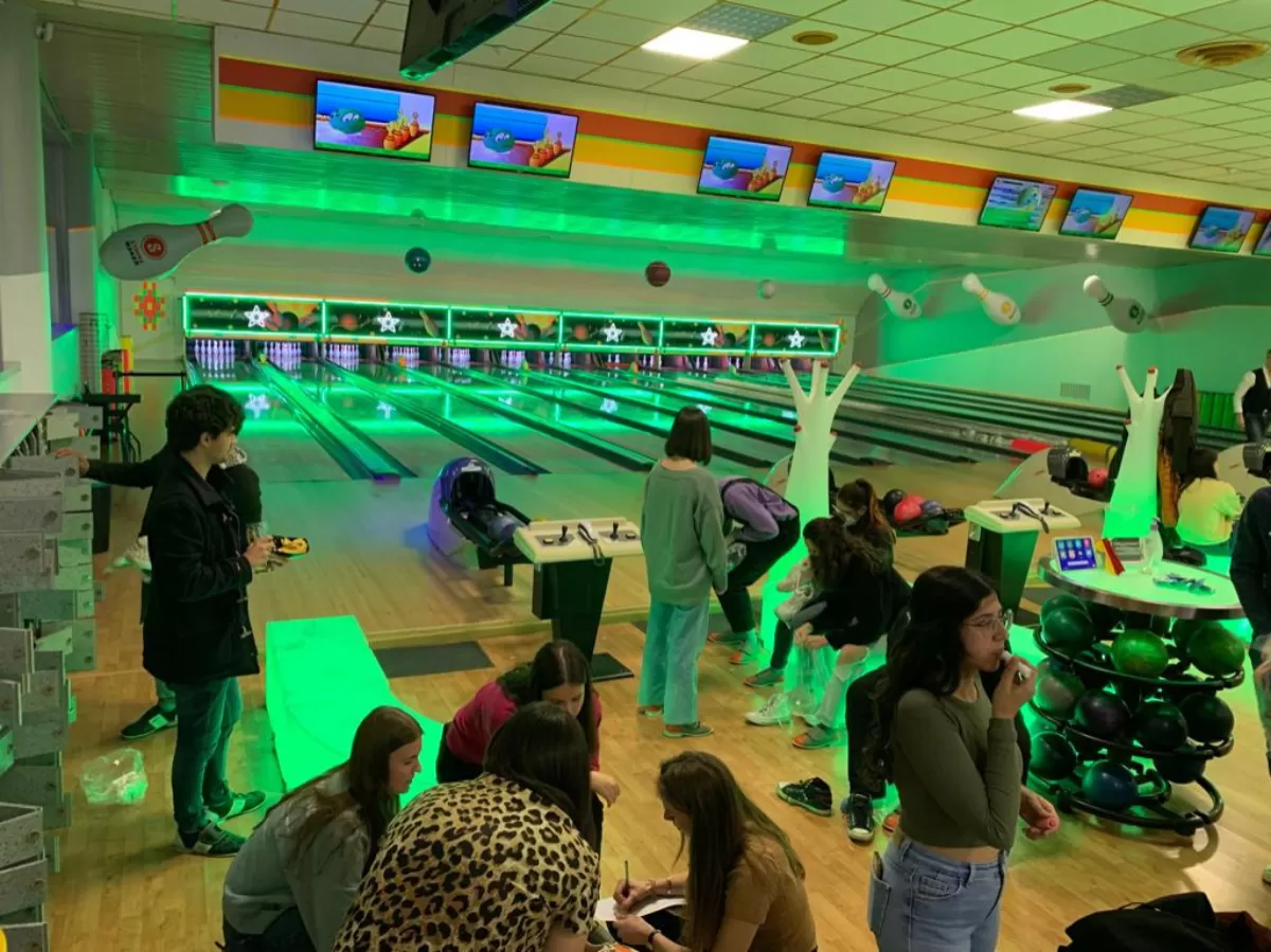 The participants playing bowling