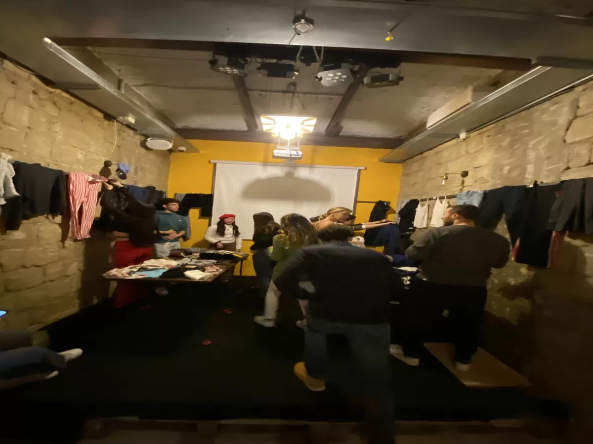 Group of international students buying clothes