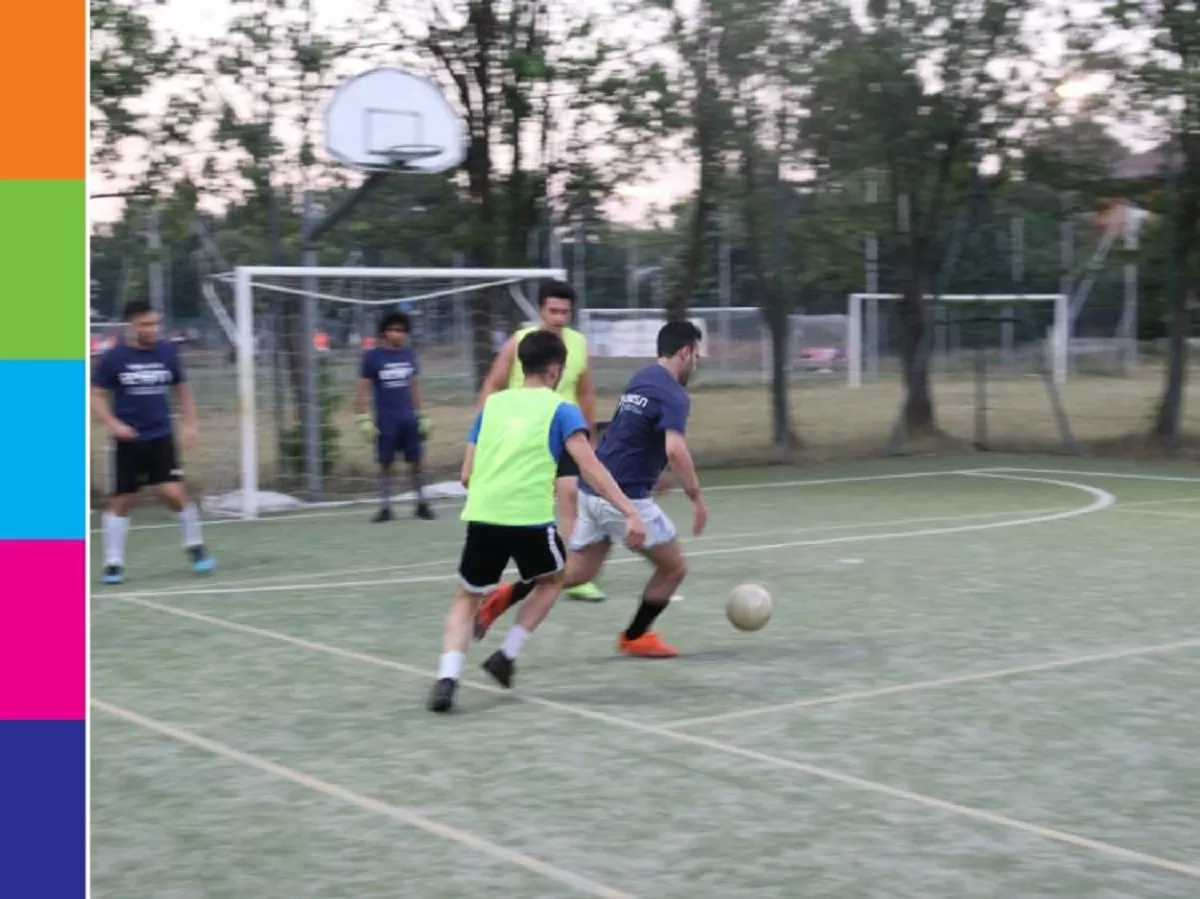 An image of football match between a representation of ESN STEP PAVIA and some international students