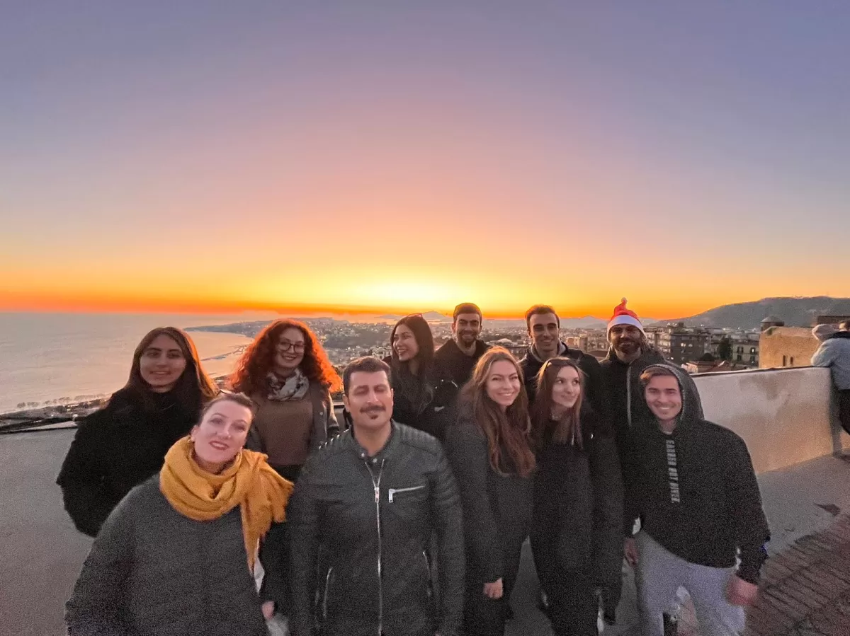 Group photo with the view from Sant'Elmo castle in the sunset