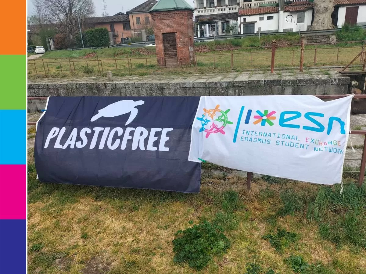 Our flag beside the flag of Plastic Free