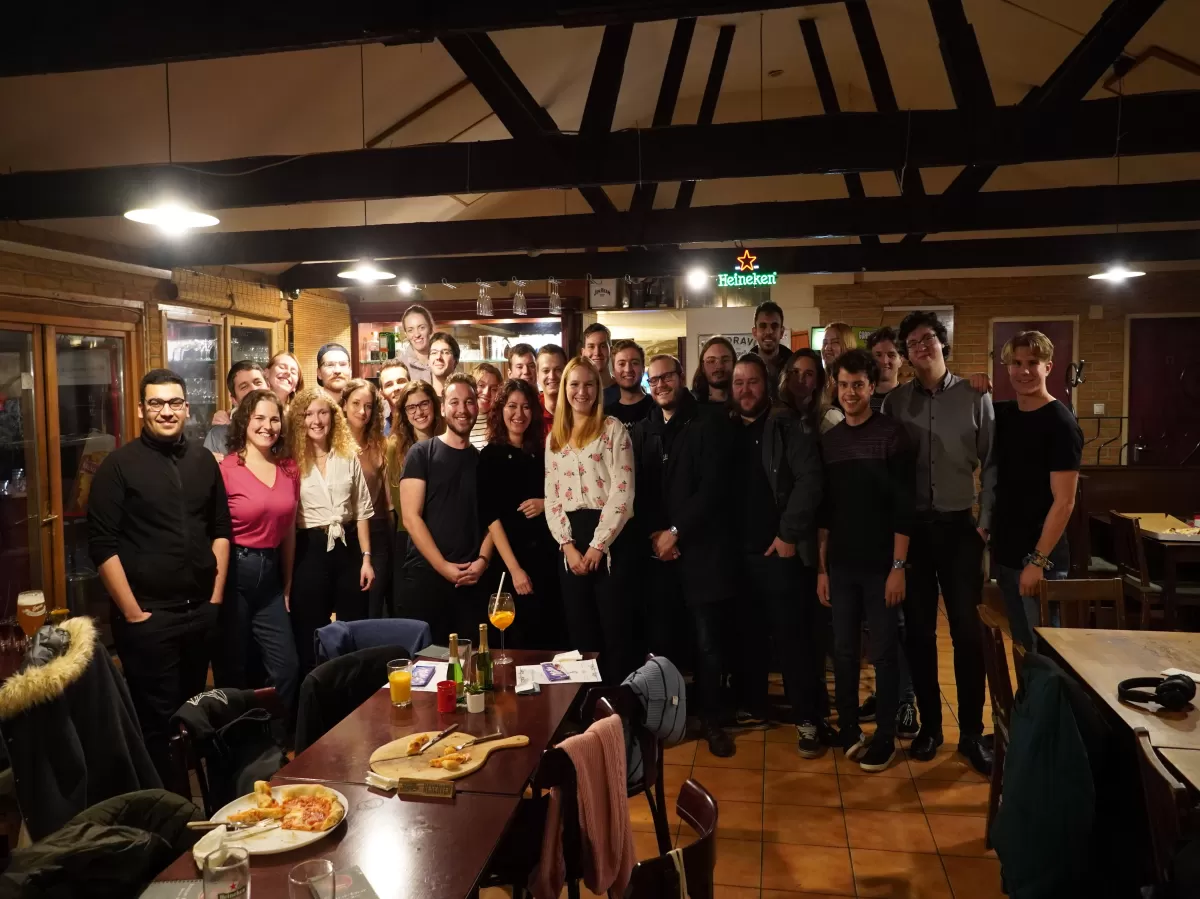 group photo in a pizzeria