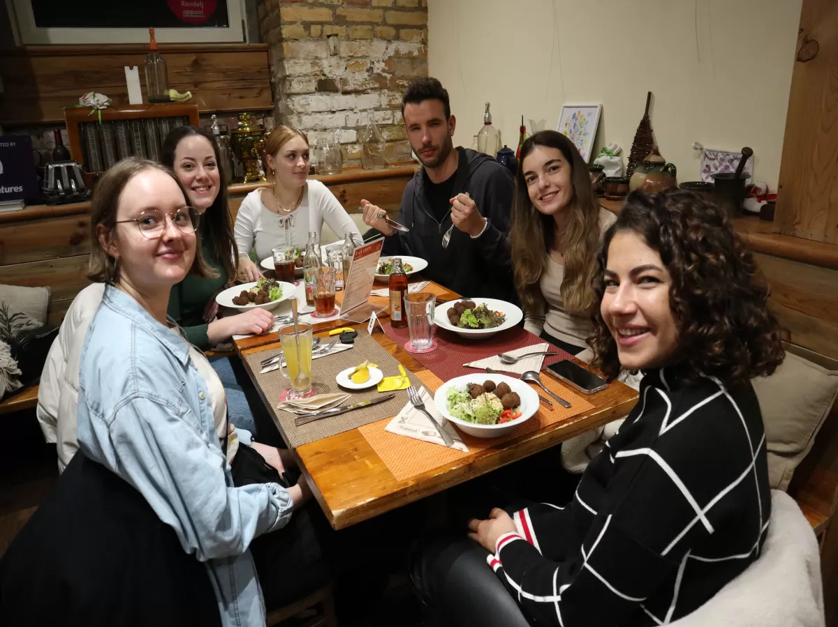 group photo around a table
