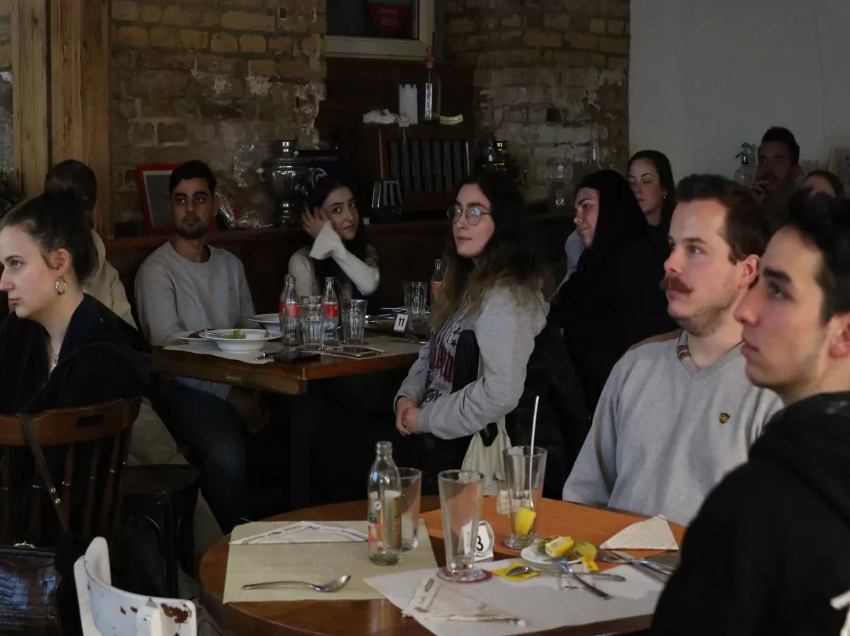 people paying attention to the presentation