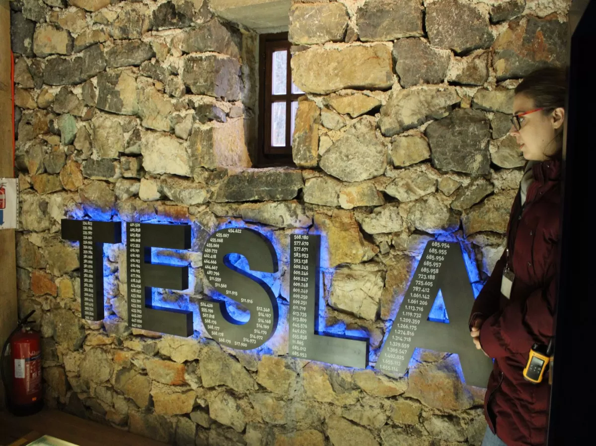 "Tesla" wall sign with blue LED lights