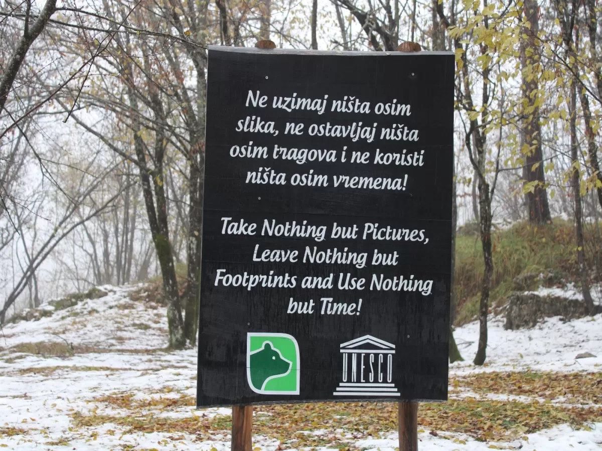 "Take nothing but pictures, leave nothing but footprints, and use nothing but time" sign in Plitvice Lakes National Park