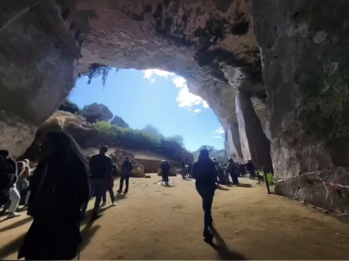 Walk on the beach, exploring a cave