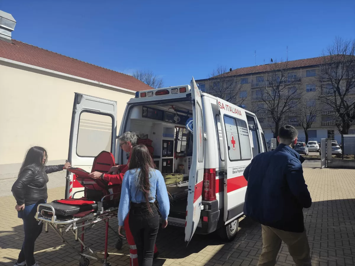 Red Cross volunteer showing the inside of an ambulance