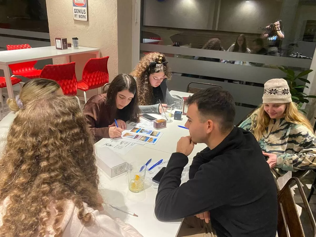 Group of international students playing games about italian culture