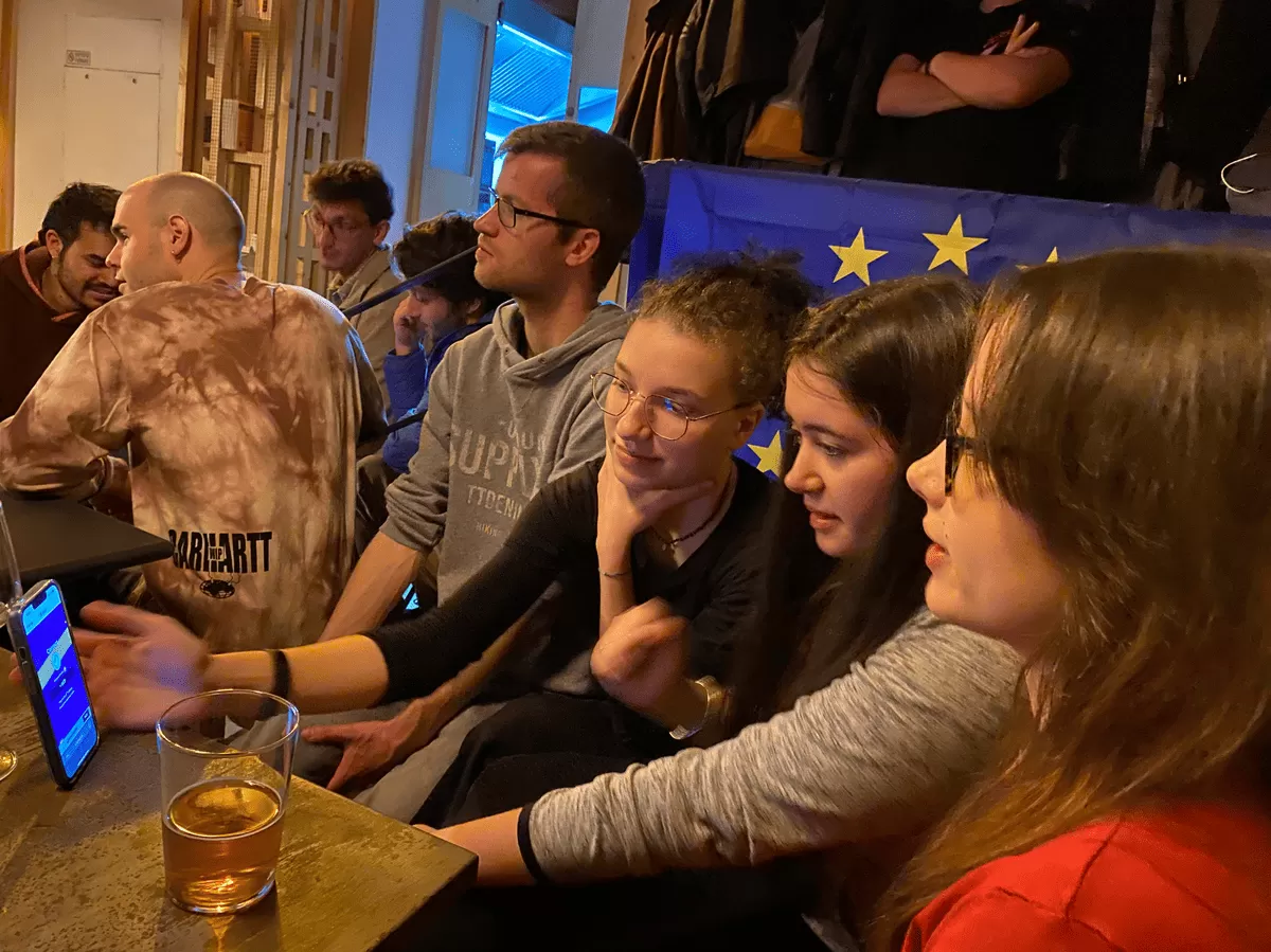 Group of international students participating in a quiz about the European Union