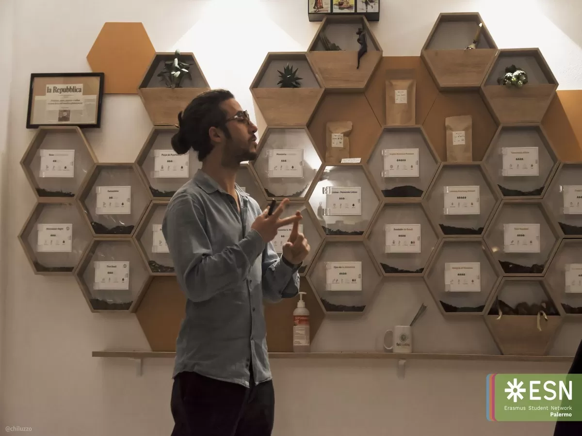 the tea store owner explained his project about tea imported from all around the world