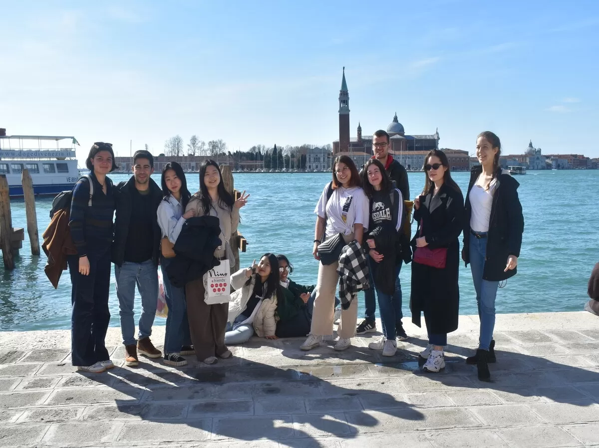 Group of international students in the Venice's laguna