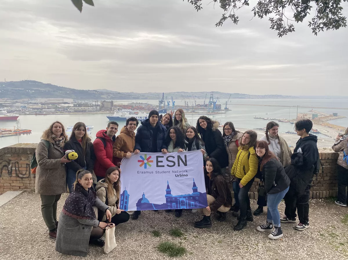 Group photo with the port of Ancona behind it
