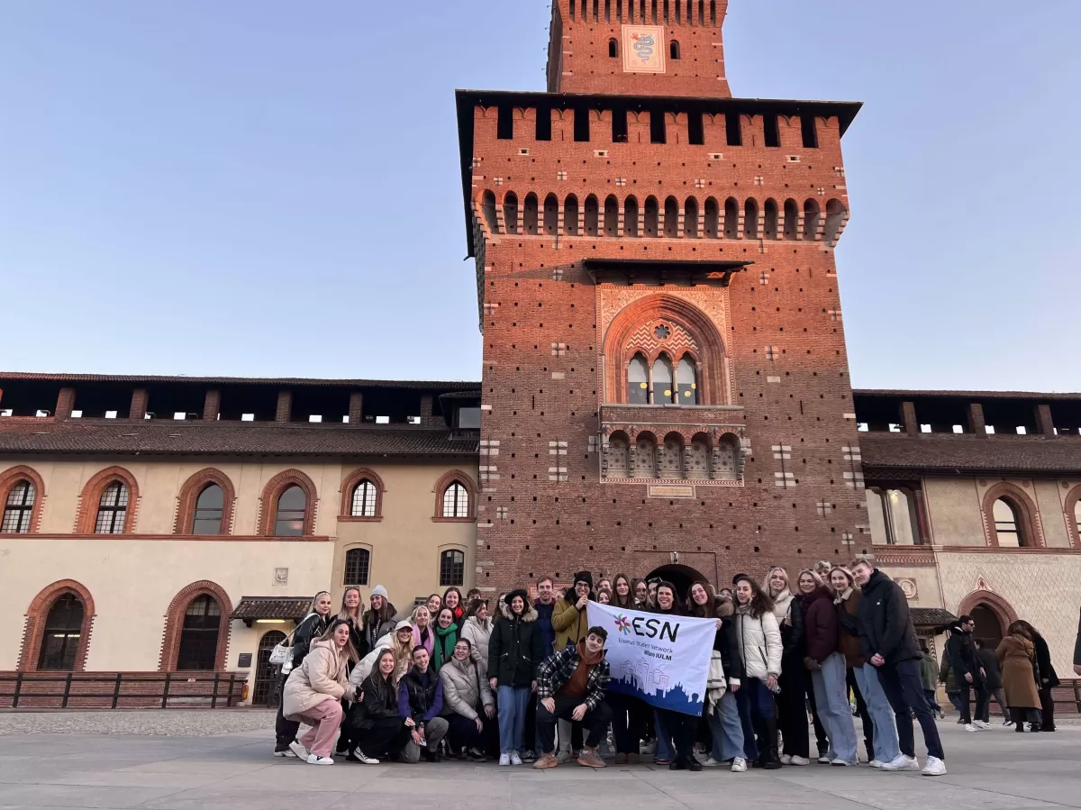 Groups of international students in front of Castello Sforzesco in Milan