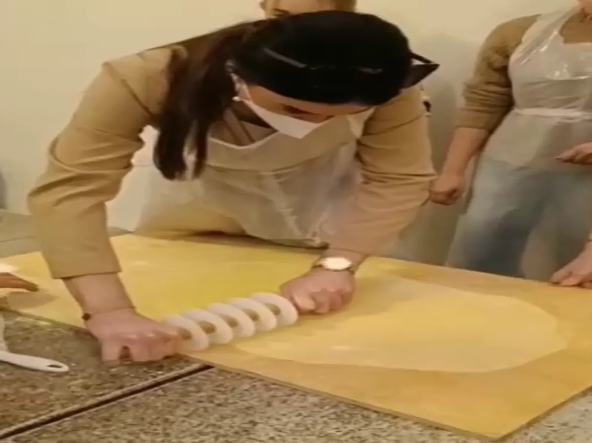 Girl preparing tortellini